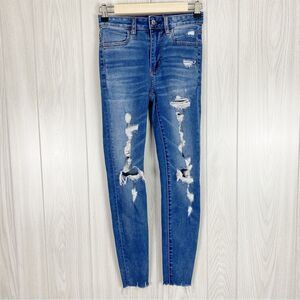 American Eagle | Medium Wash Distressed Super Hi Rise Jegging Size 00 Short